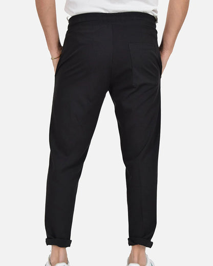 Pantalones con cordón™ | El pantalón fluido con cintura ajustable a ti